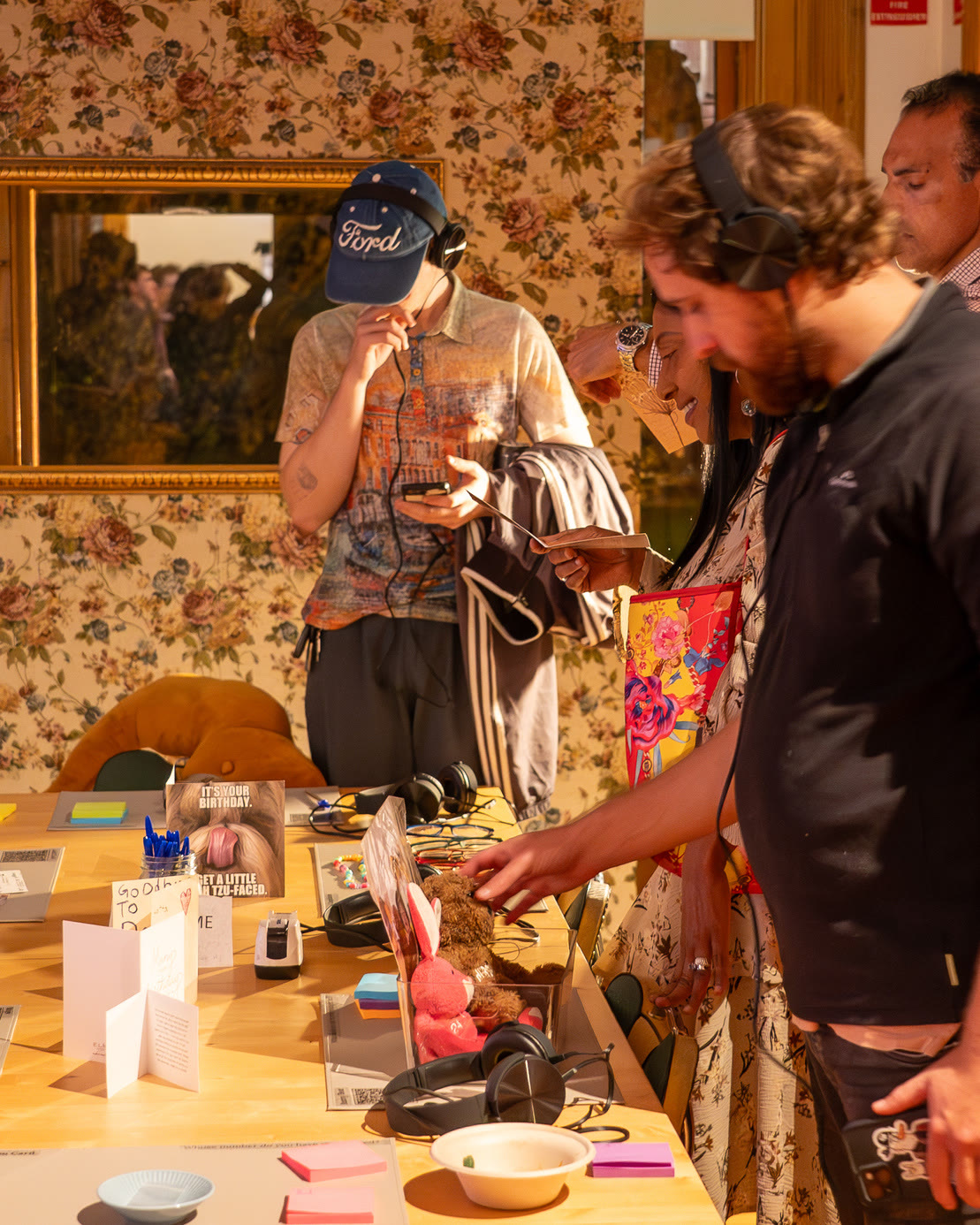 Visitors at an interactive table work